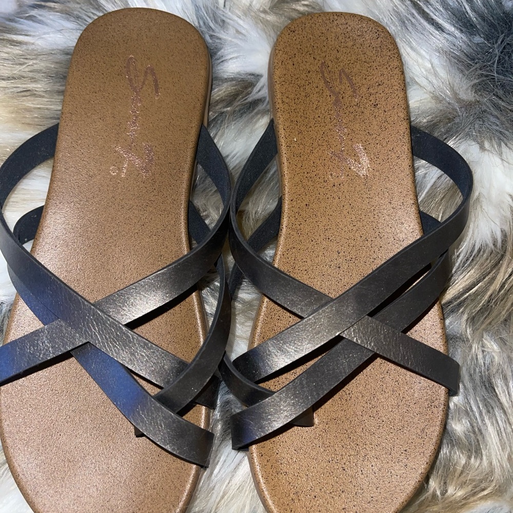 Seven strap sandals.